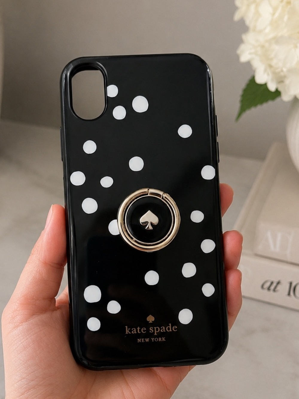 Kate Spade iPhone 11 Pro case with gold emblem stand